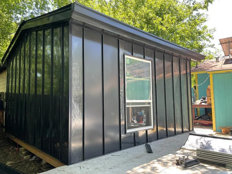 Black standing seam metal wall panels for Roof Inspection in Tolleson